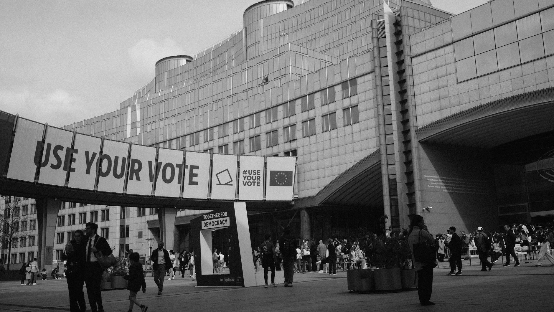 European Parliament building with a voting message